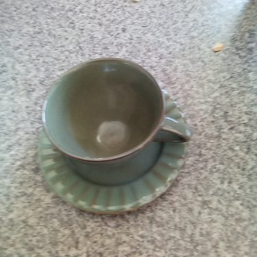 Puodelis su lėkštute