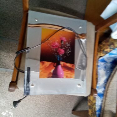 Paveikslas su apšvietimu