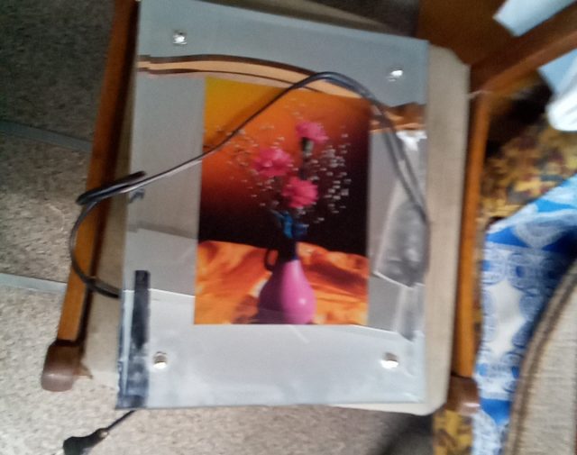 Paveikslas su apšvietimu