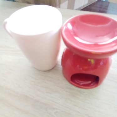 Puodelis ir žvakidė